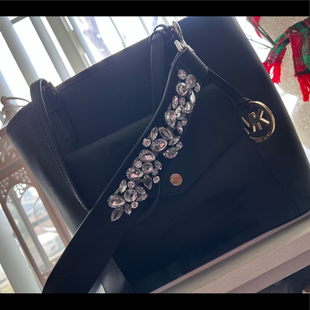 Black Michael Kors bag with bling strap and front pocket